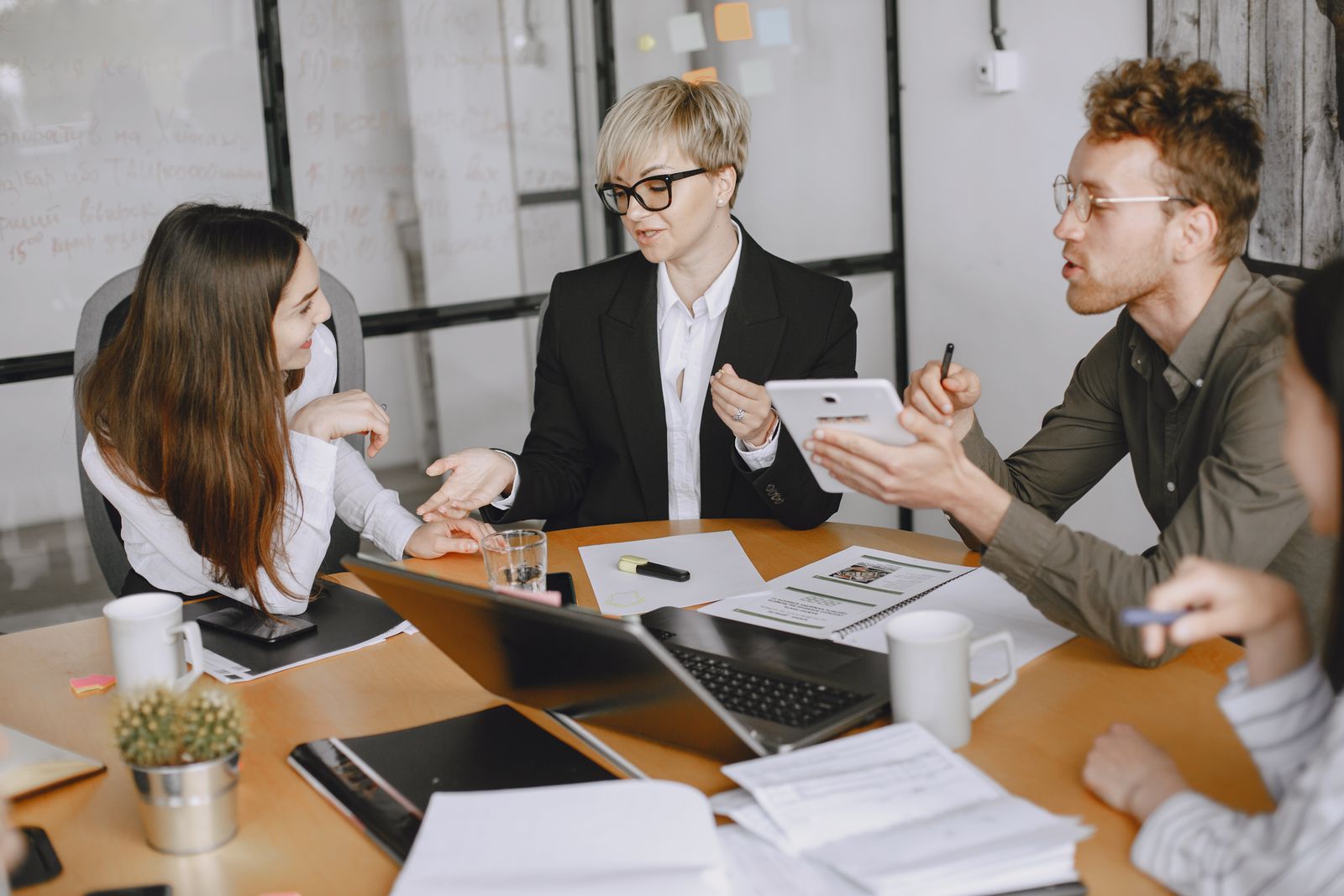 Business broker meeting with a business owner to review a confidential business sale